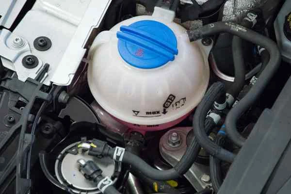 coolant bottle underneath car bonnet